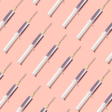 Repeated syringes on the pink background cosmo