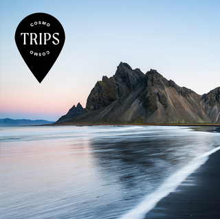 cosmo trips logo with a mountain in the background cosmo trips logo with a mountain in the background